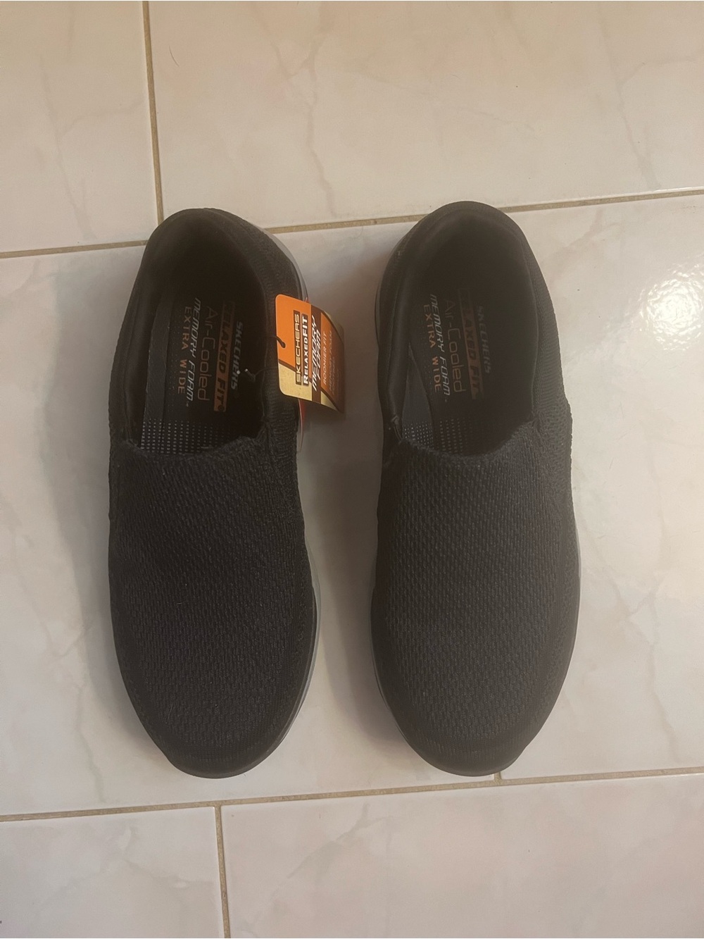 Skechers Men’s Black Relaxed Fit Air-Cooled Memory Foam Knit Loafers